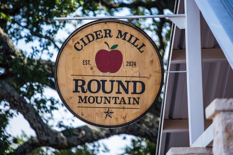 Round Mountain Cider Mill wooden sign